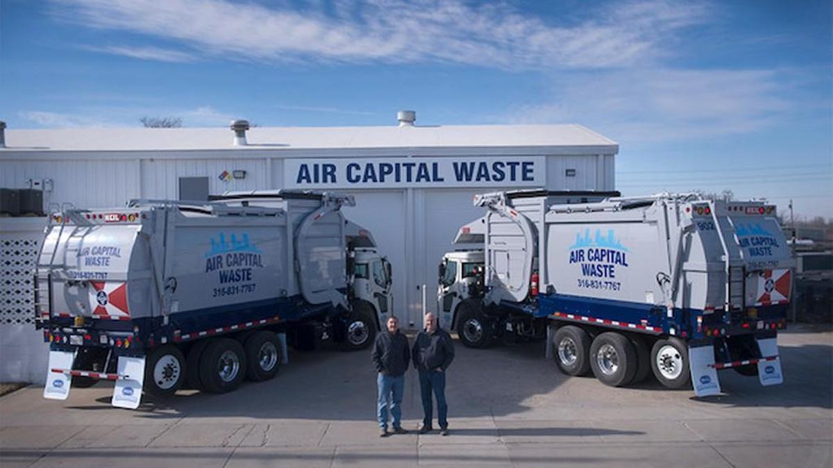 Air Capital Waste owner Jim Spencer, right, and Jeff Fawcett, a partner and vice president of sales.
