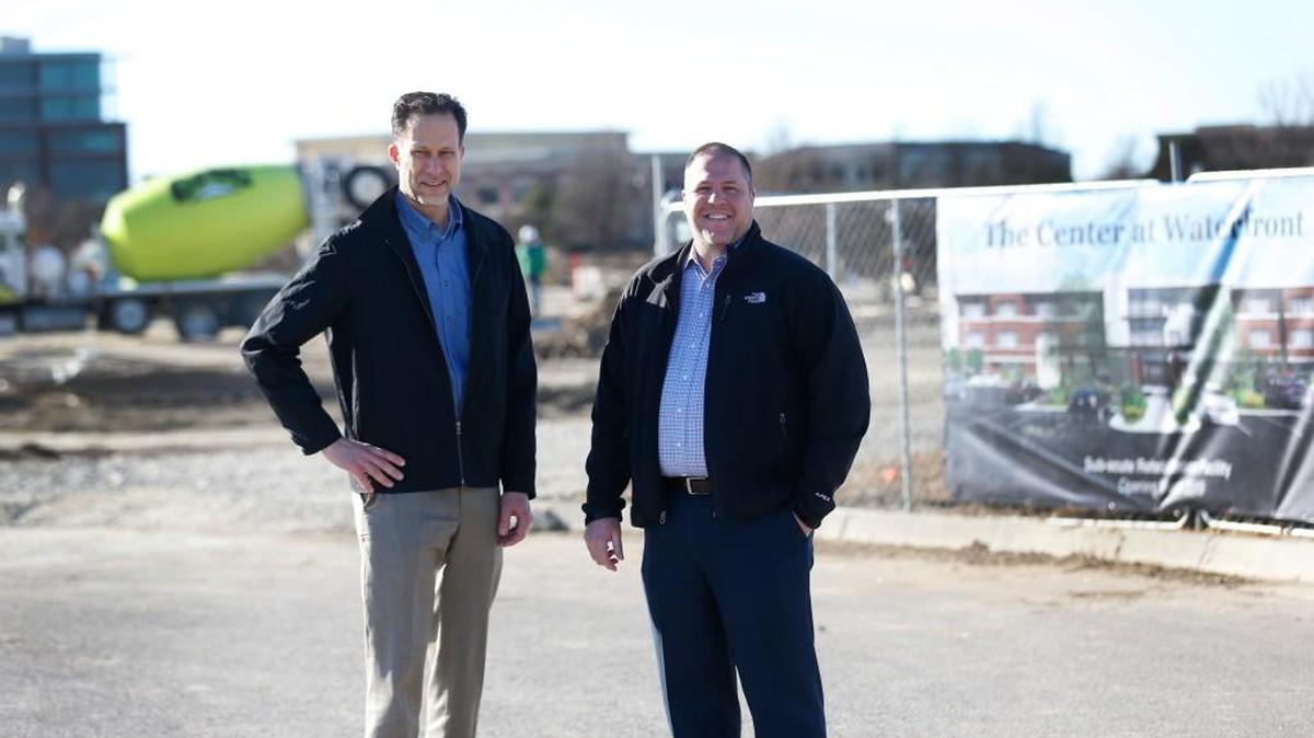 Physicians Dan Prohaska, left, and Bradley Dart at the site for Center at Waterfront, a rehabilitation facility that will open at the Waterfront at 13th and Webb Road in March 2019. The center is a joint venture that includes 120 Wichita-area physicians who want alternatives to care for patients once they leave acute-care facilities.