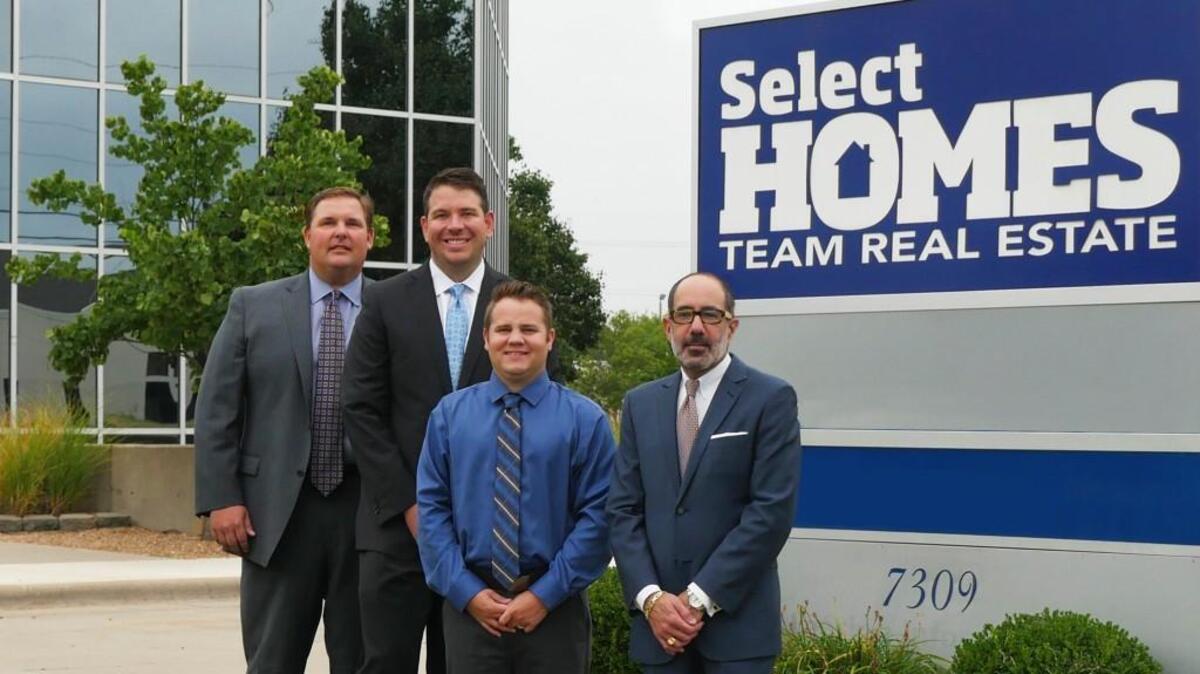 Brandon Knowles, left, is leading a group that now has controlling interest in Select Homes Team Real Estate, which also includes partners Brian Brundage, Adam Bailey and Grant Farha.