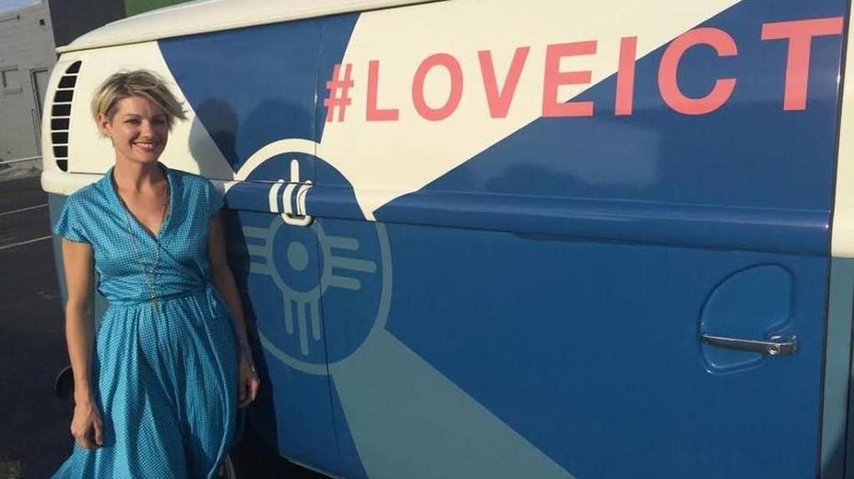Workroom owner Janelle King, standing at the VW bus she uses to promote Wichita and Wichita-related merchandise, has a new idea to accomplish more in a workday.