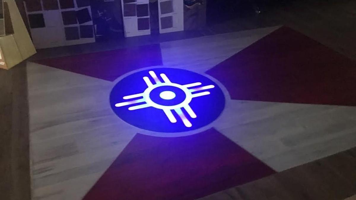 The Wichita flag shines from the floor of Wichita Wood Floor Specialists in the Douglas Design District.