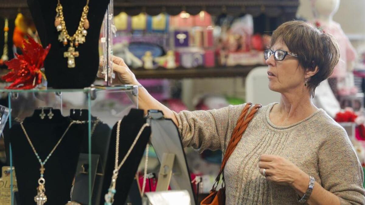 Joni Mills of Clearwater shops at Kay Wiggins Jewelry & Gifts last year.