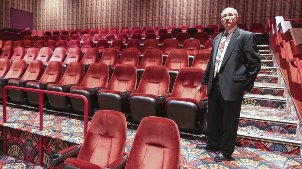 Les Padzensky, vice president of food and beverage for Warren Theatres, says the seating in the eight auditoriums of the new Warren 21 will be reduced from 1,000 chairs to about 500 reclining ones. (Nov. 5, 2015) 