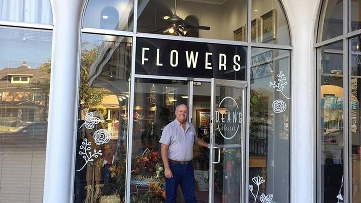Brad White in the new doorway of Dean’s Designs at Happiness Plaza.
