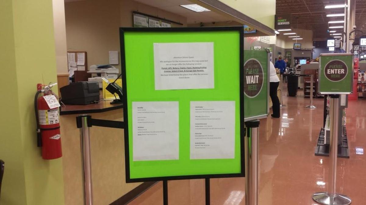 Dillons has signs at its stores informing customers of certain services that will no longer be offered as part of a reallocation of resources.