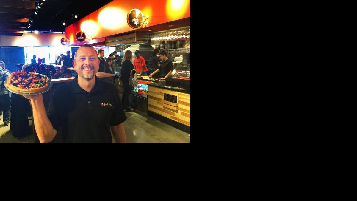 
Rhod McNee at the Rock Road Pie Five Pizza, one of three Pie Fives that he and Jim Stevens have opened so far.
