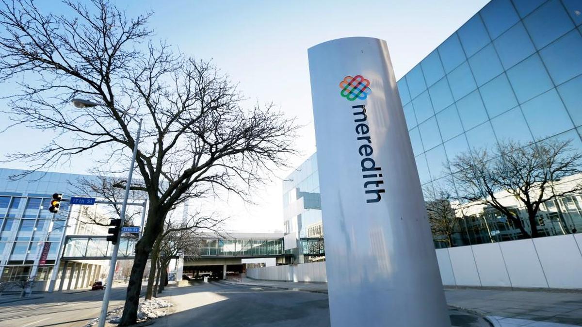 This March 11, 2015, file photo shows the Meredith Corp. headquarters building in Des Moines, Iowa. Meredith Corp. is buying Time Inc. for about $1.8 billion in a deal that joins two giant magazine companies.