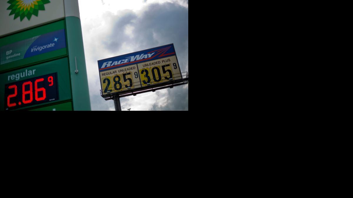 
Gas station prices are posted for passing motorists in Augusta, Ga., in late October. The Energy Department’s Energy Information Administration predicts in its most recent short-term energy outlook, released Wednesday, that drivers will pay $2.94 per gallon on average in 2015, 45 cents lower than this year. 
