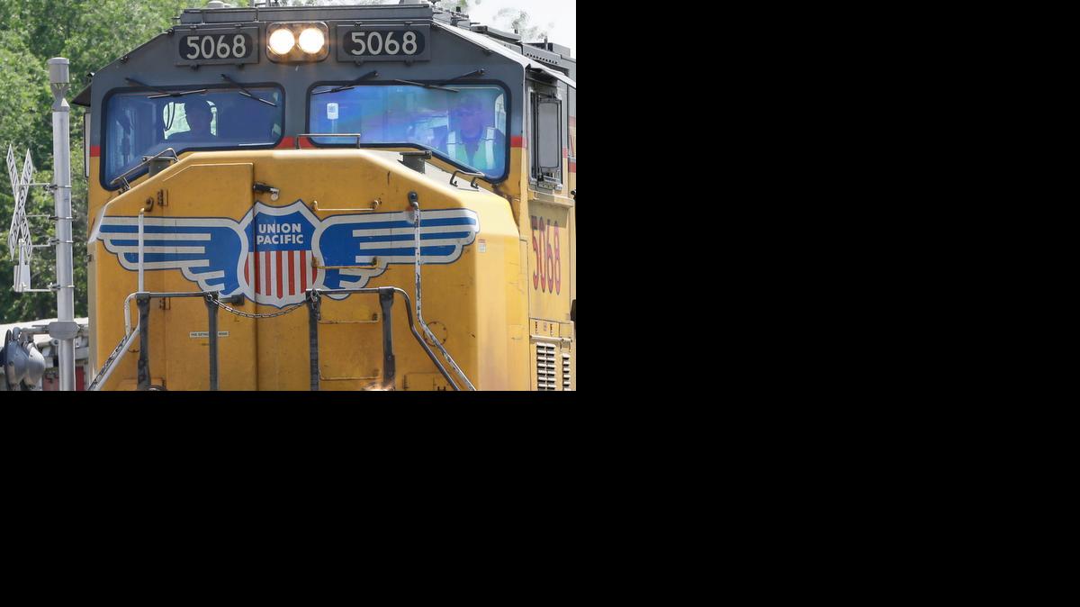 
A Union Pacific locomotive with two operators travels through Council Bluffs, Iowa, in June. 


