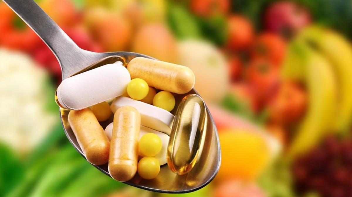 Photo illustration of vitamins and supplements