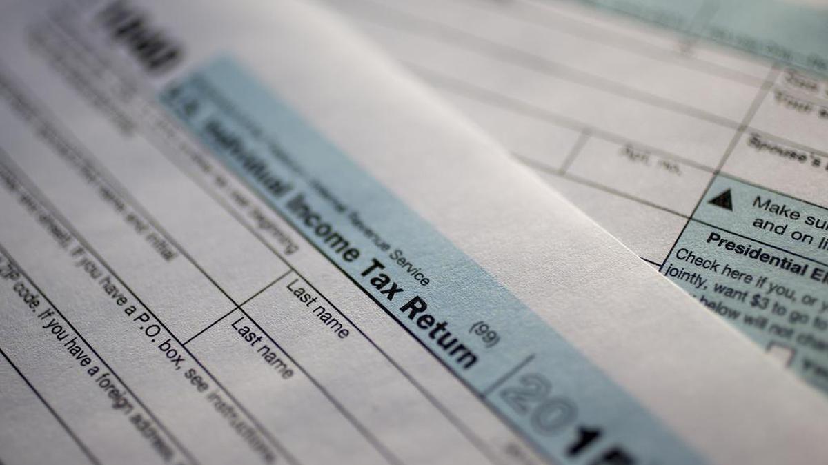 U.S. Department of the Treasury Internal Revenue Service (IRS) 1040 Individual Income Tax forms for the 2015 tax year are arranged for a photograph in Washington, D.C., U.S., on Tuesday, Jan. 19, 2016.