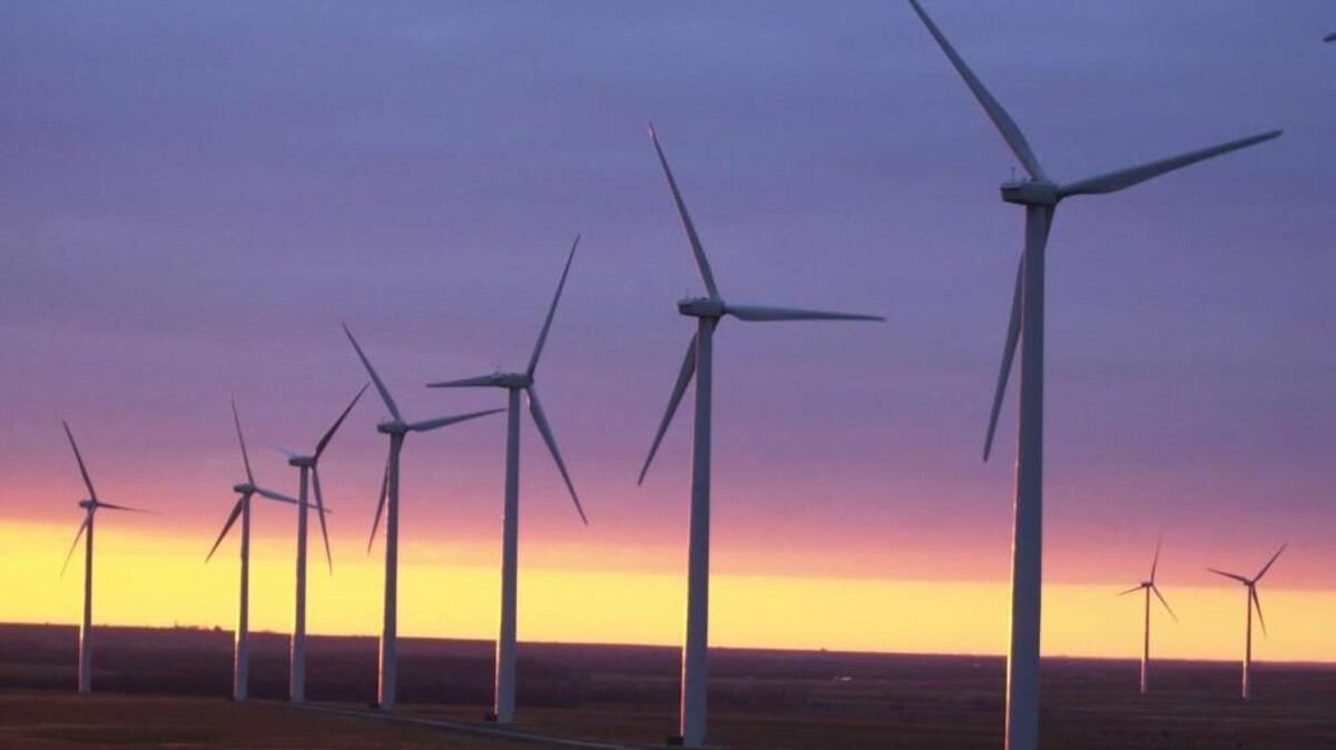 Giant power generating windmills dominate the skyline south of Beaumont.
