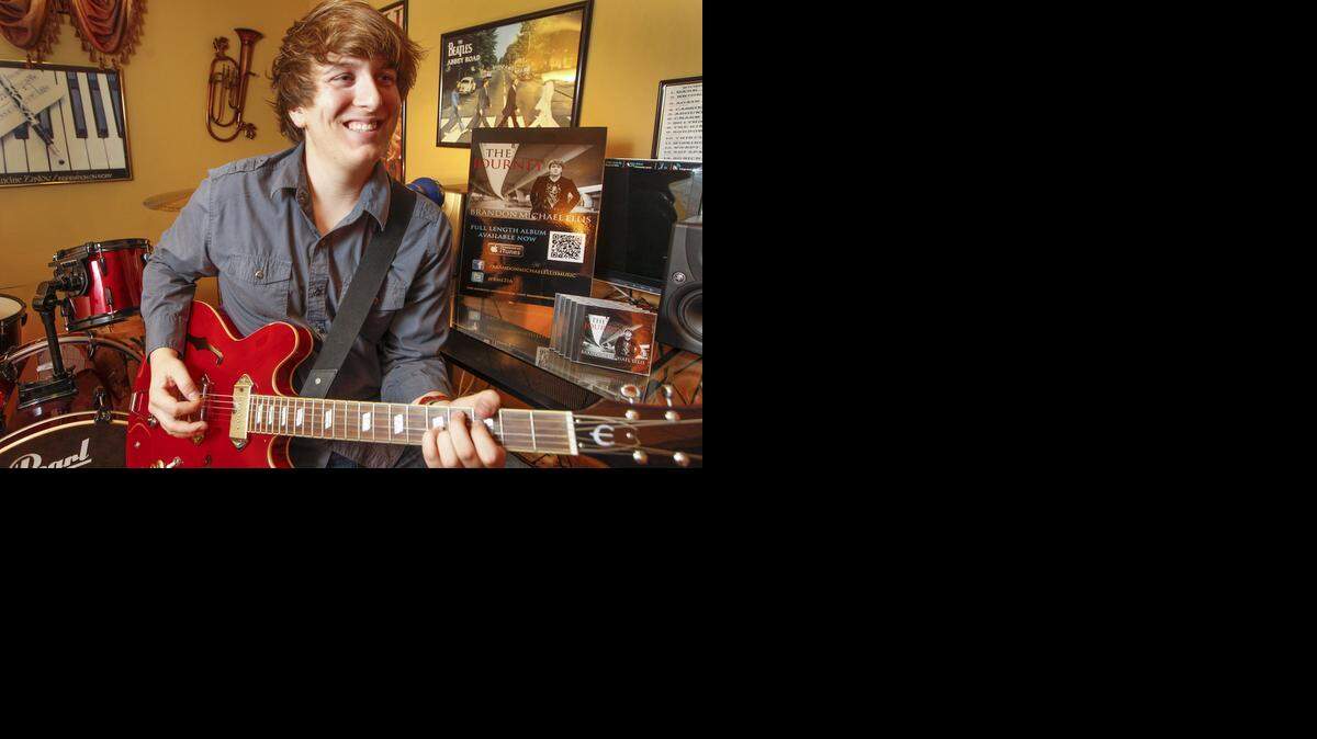 
Brandon Michael Ellis funded his album and video through crowdsourcing. He’s pictured in his home studio on Wednesday. (Sept. 17, 2014) 
