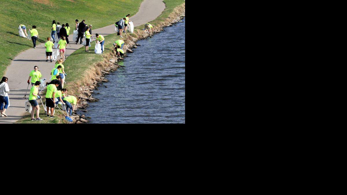 
Volunteers participate in the 2014 Arkansas River Trash Roundup.
