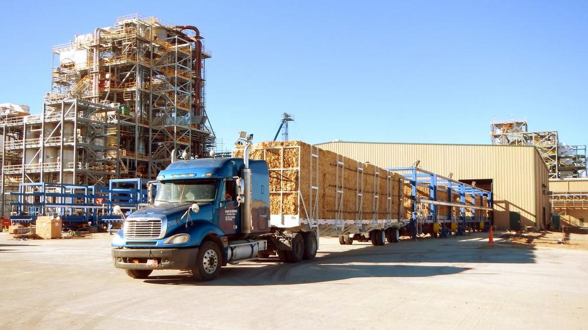 In this photo from 2014 provided by Abengoa, a load of biomass, agricultural crop residues, is delivered to Abengoa’s biorefinery in Hugoton.