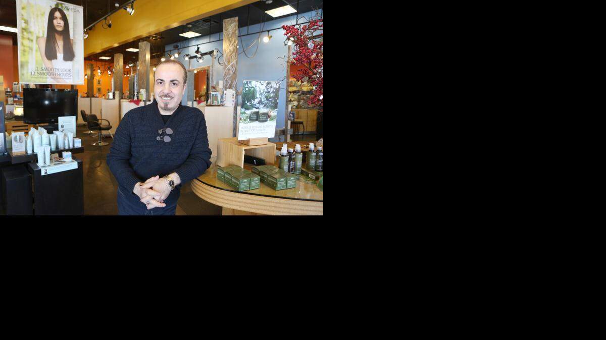 
Owner Sami Halaseh stands in his Sami Halaseh Salon at Bradley Fair. Halaseh is building a new salon and beauty school in Andover.
