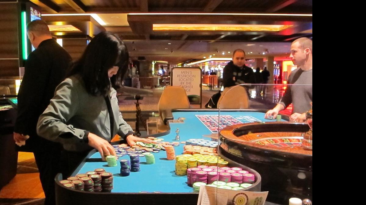 
A dealer works at the Tropicana casino in Atlantic City, N.J., where casinos are competing in an increasingly crowded market. Figures released May 22 show the Tropicana’s gross operating profit declined by nearly 93 percent in the first quarter of this year, to less than $2.4 million.
