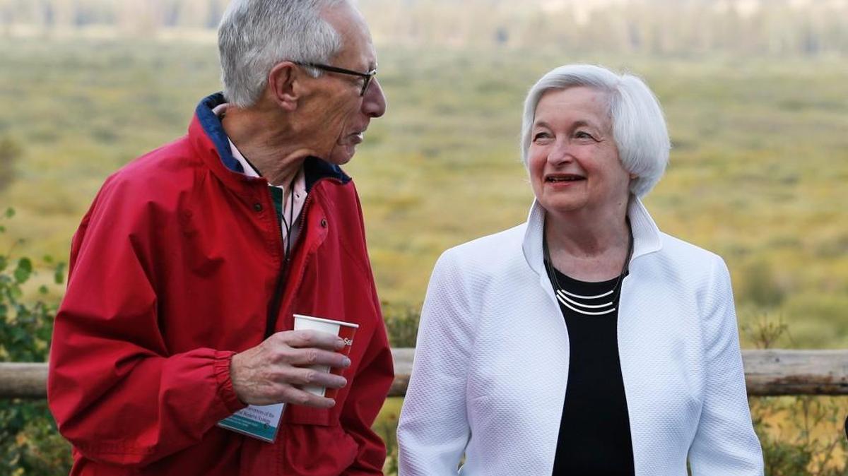 Federal Reserve Chair Janet Yellen, right, talks with Stanley Fischer, vice chairman of the Board of Governors of the Federal Reserve System, before her speech to the annual invitation-only conference of central bankers from around the world on Friday at Jackson Lake Lodge in Grand Teton National Park, north of Jackson Hole, Wyo.