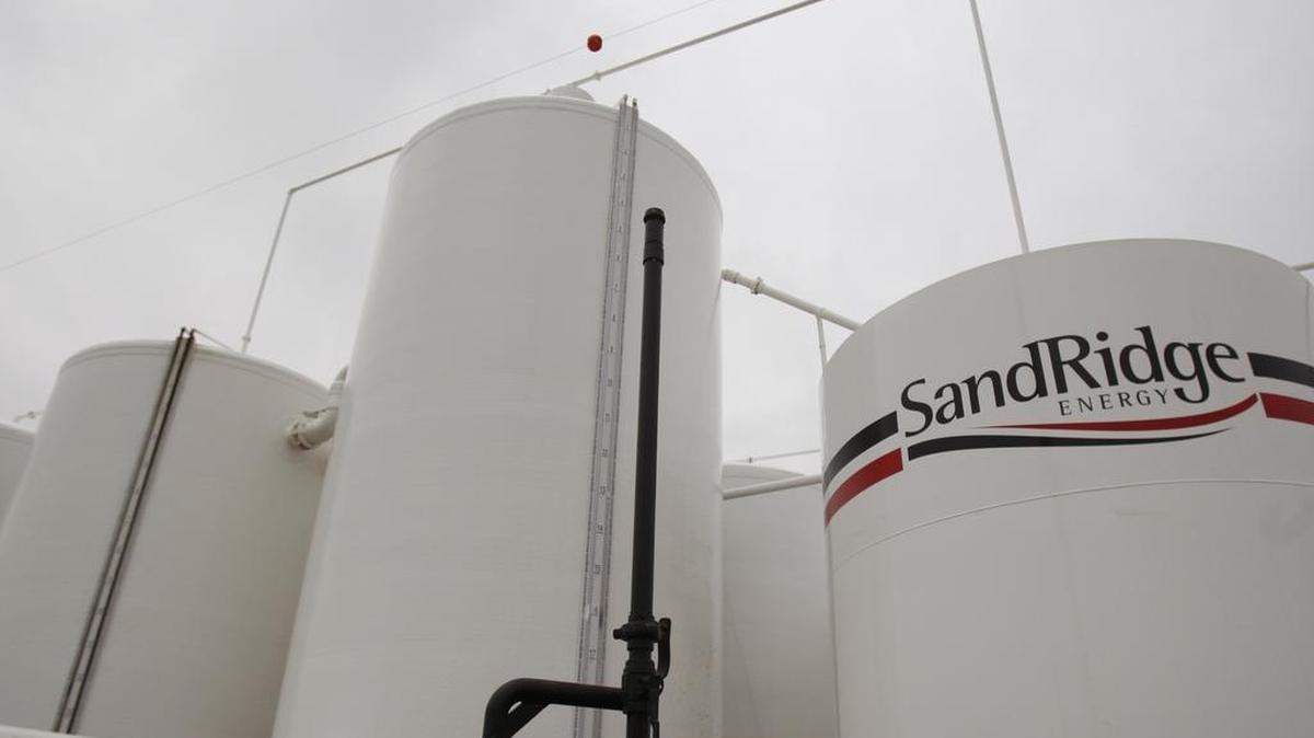 SandRidge Energy said Wednesday that it would file its annual financial statement late as it negotiates with bondholders to reduce its $4 billion debt.
