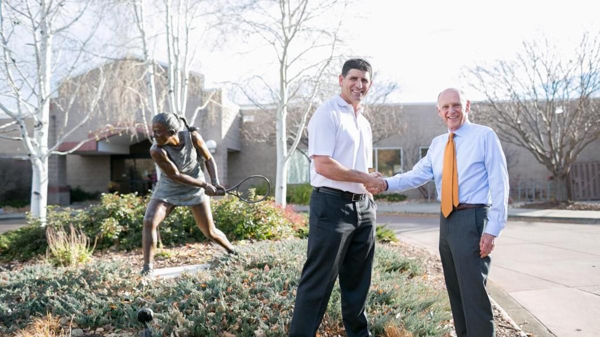 Genesis Health Clubs owner Rodney Steven II, left, with Cliff Buchholz of Miramont Lifestyle Fitness outside a Miramont club. Genesis has acquired Fort Collins, Colo.-based Miramont, which operates four clubs in the Fort Collins area.