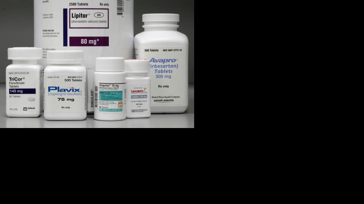 
Bottles of prescription drugs – Lipitor, TriCor, Plavix, Singulair, Lexapro and Avapro – are displayed at Medco Health Solutions Inc., in Willingboro, N.J., in 2011. Express Scripts Holding Co. said Tuesday that Americans’ spending on prescription drugs rose 13 percent last year, the largest annual increase since 2003.
