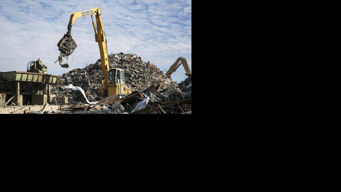
Scrap metal is dropped into a shredder at Allmetal Recycling. 

