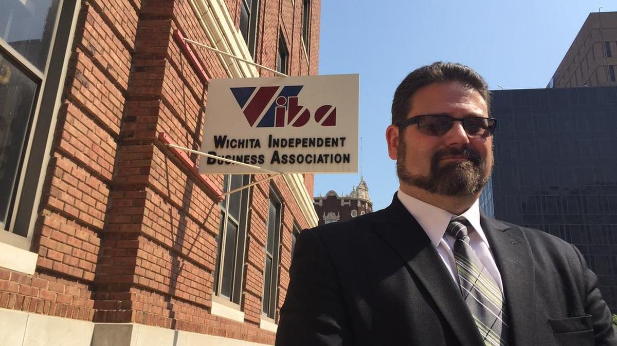 
New Wichita Independent Business Association president Lon Smith stands outside the organization’s headquarters in downtown Wichita on Tuesday. 
