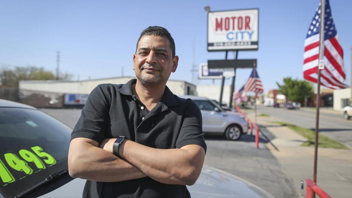 Mohamed Gamel, owner of Motor City Sales, says he has had to raise the price of his cars in recent years.