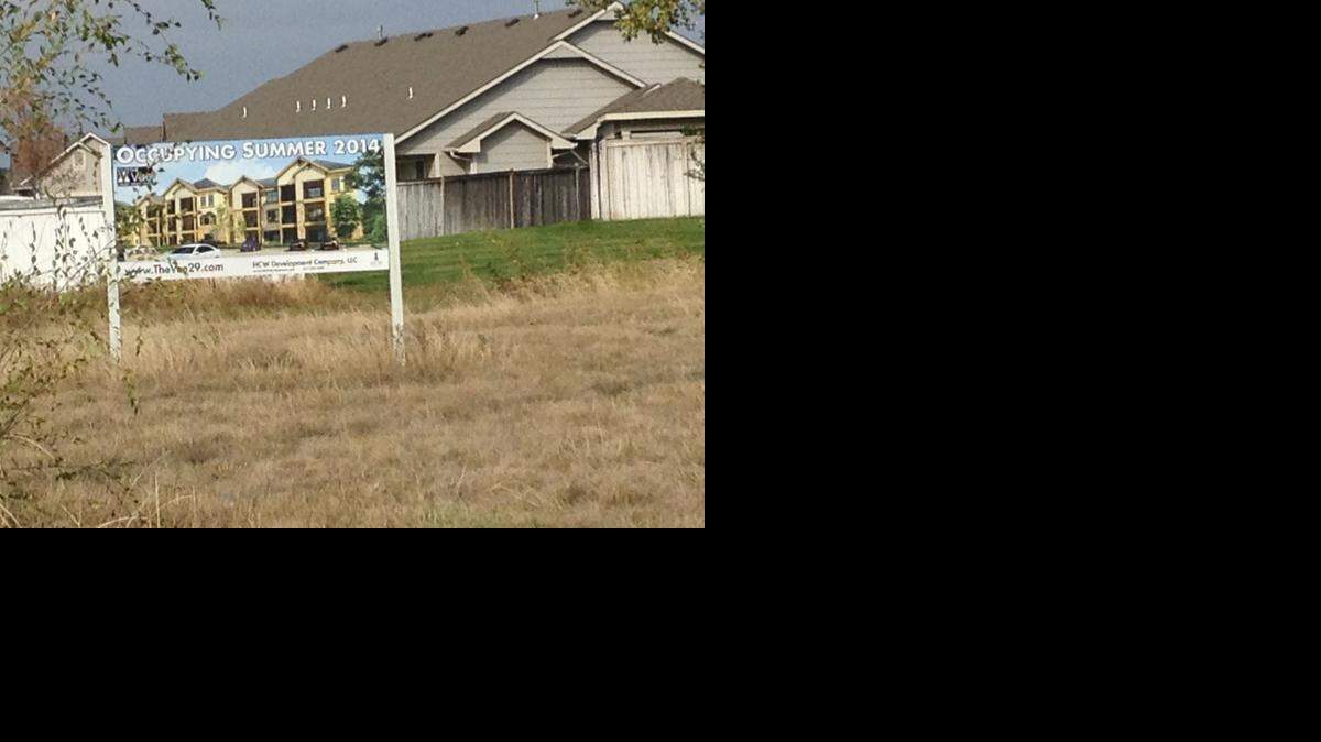 
A sign at the site of the planned the Vue luxury apartment complex near 29th and Ridge says they will be available to occupy in summer 2014. Developers said this week that changing financing rates delayed the start of the project, which now is expected to break ground in March.
