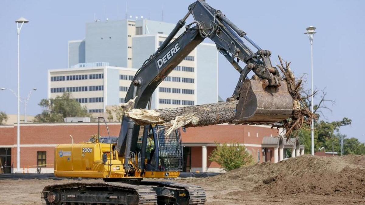 
Construction crews on Tuesday clear the land where the new Pinnacle Lofts and Apartments will be near Waco and Central. (Sept. 1, 2015) 
