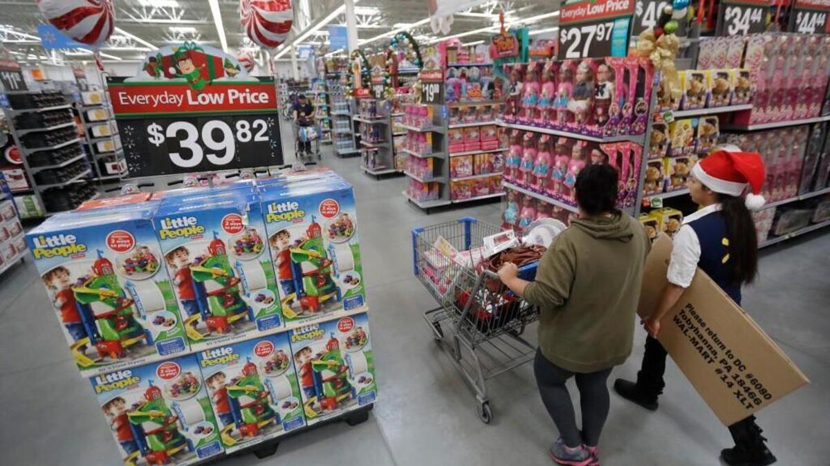 For a second year in a row, Walmart has reduced the number of seasonal, holiday workers it hires and is instead offering its regular workers more hours to pick up over the Christmas shopping season.
