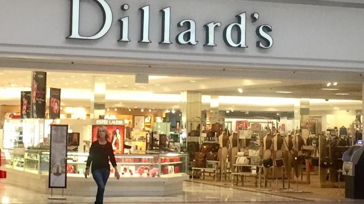 Shoppers visit Towne West Square in 2014. The Dillard’s store in the mall is being converted to clearance outlet.