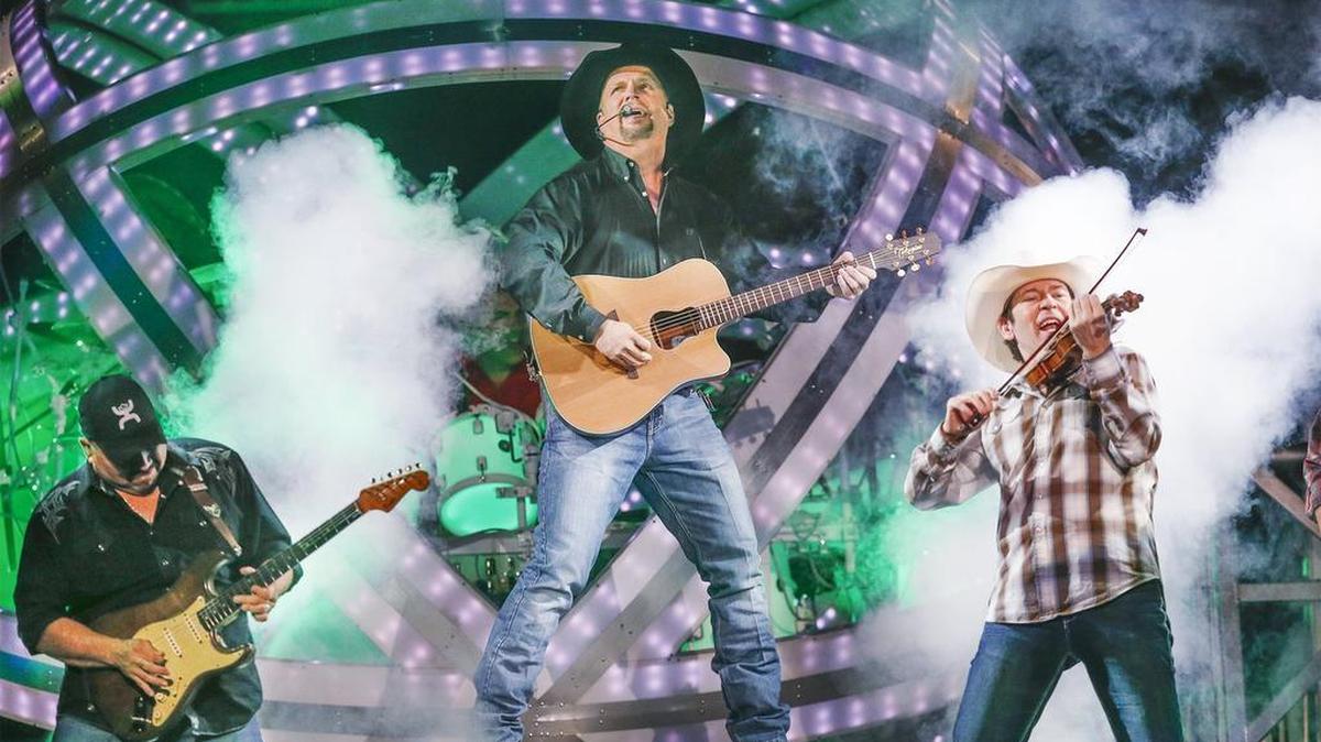 Garth Brooks entertains the crowd at the Intrust Bank Arena on Dec. 3.