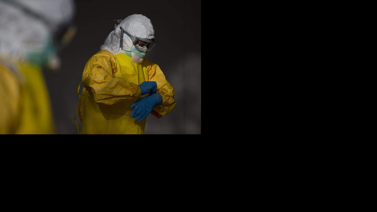 
Manufacturers and distributors of impermeable gowns and full-body suits are adding workers and taking other steps to try to keep up with the surge in demand for protective gear that is designed to protect first responders and medical workers from Ebola.
