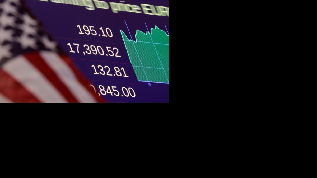 
A screen above the trading floor of the New York Stock Exchange shows the closing number for the Dow Jones industrial average Friday. U.S. stocks ended October solidly higher, up 2.3 percent. The Dow Jones industrial average capped the rally by rising 195.10 points.
