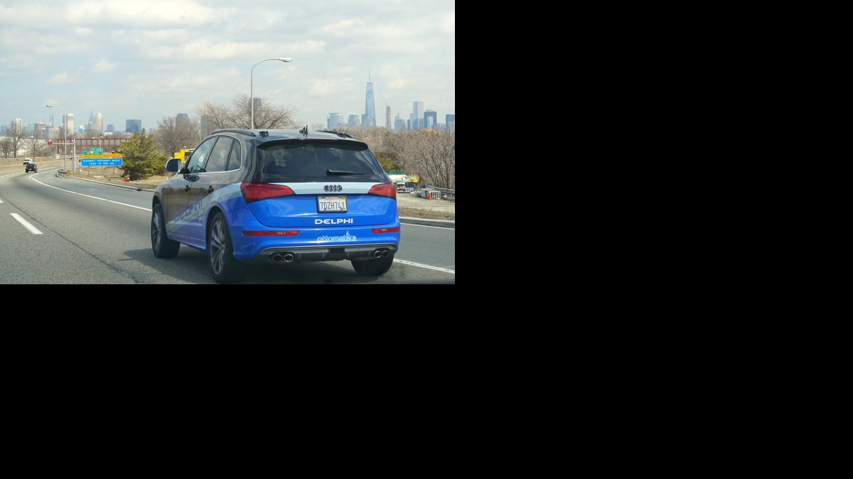 
A car outfitted by Delphi Corp. approaches New York City, its final destination after a 3,400-mile road trip across the U.S. Ninety-nine percent of the time, the car steered itself; only in very tricky situations, like a construction zone, did drivers take control. Now engineers will take the reams of data from the trip and use it to further advance autonomous technology. 
