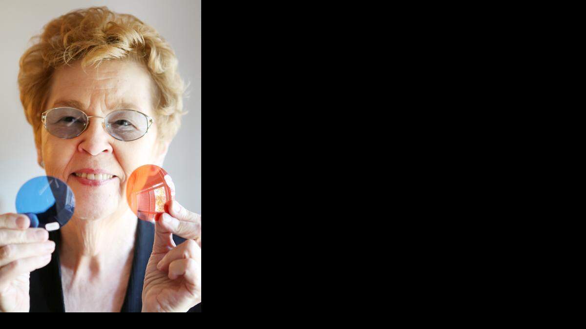 
Cathryn Hay, with Irlen Clinic of Wichita, holds up colored lenses for eyeglasses. She says the lenses help people with migraine headaches, light sensitivity, reading problems and environmental distortions. 
