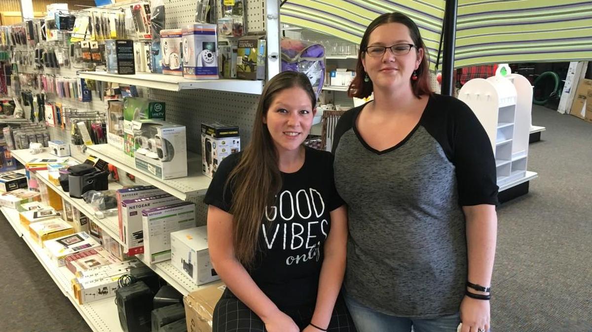 Aura Seba, right, and her sister, Kira Miller, sell “a little bit of everything” at their A to Z Discount store.