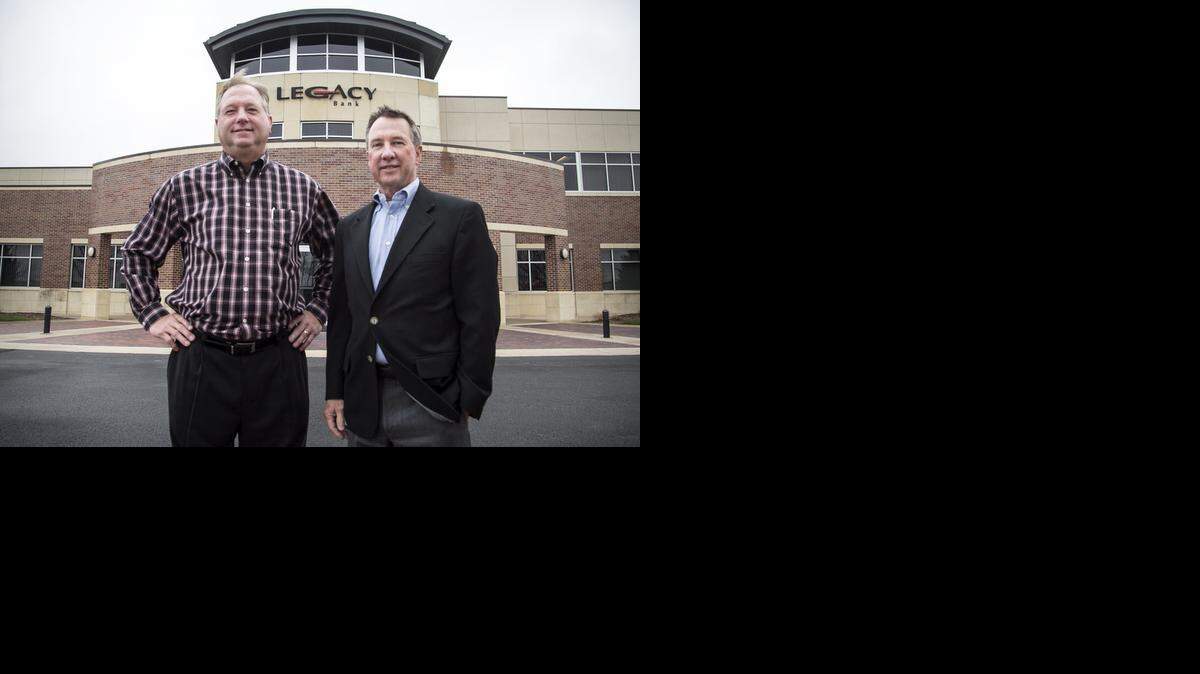 
Legacy Bank executives Frank Suellentrop, left, and Brad Yaeger, say their approach to banking reflects a desire to invest in their community. The bank is among the finalists in the Wichita Metro Chamber of Commerce's Small Business Awards. 
