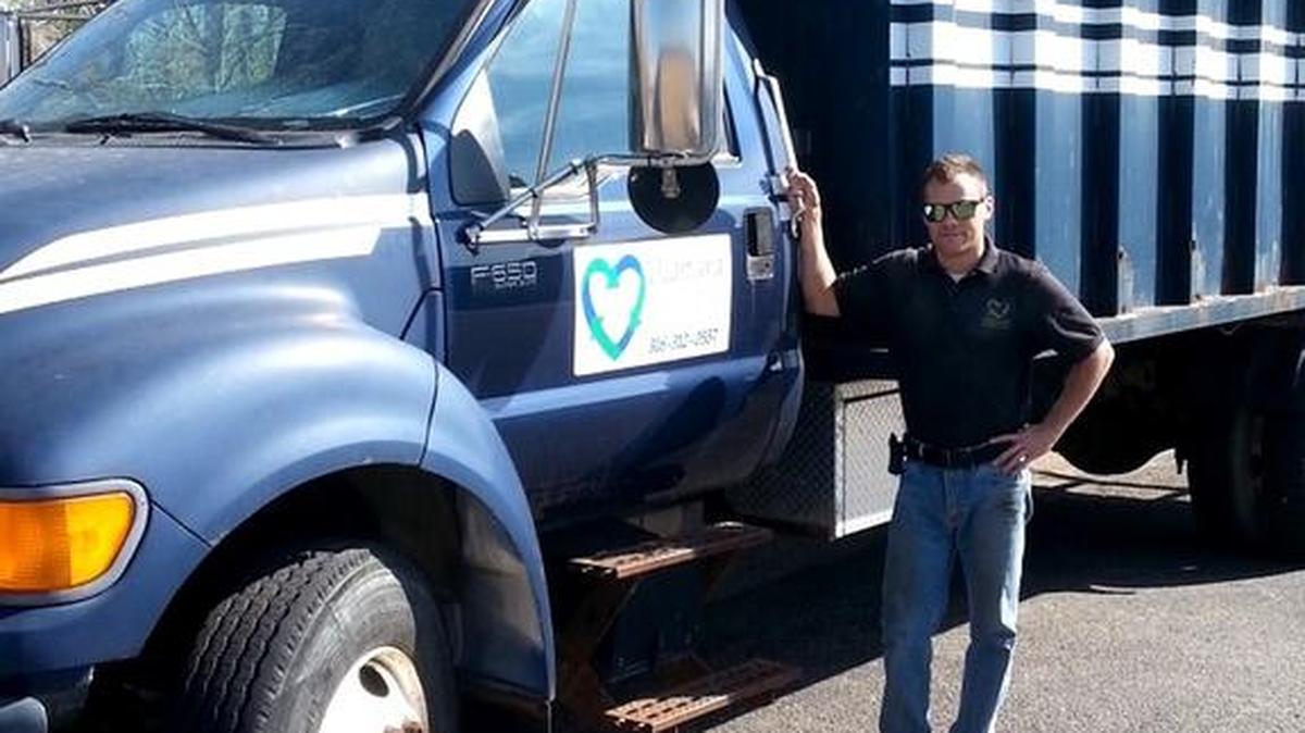Travis Baker launched Heartland Recycling Services in 2013 with a pickup and a trailer.