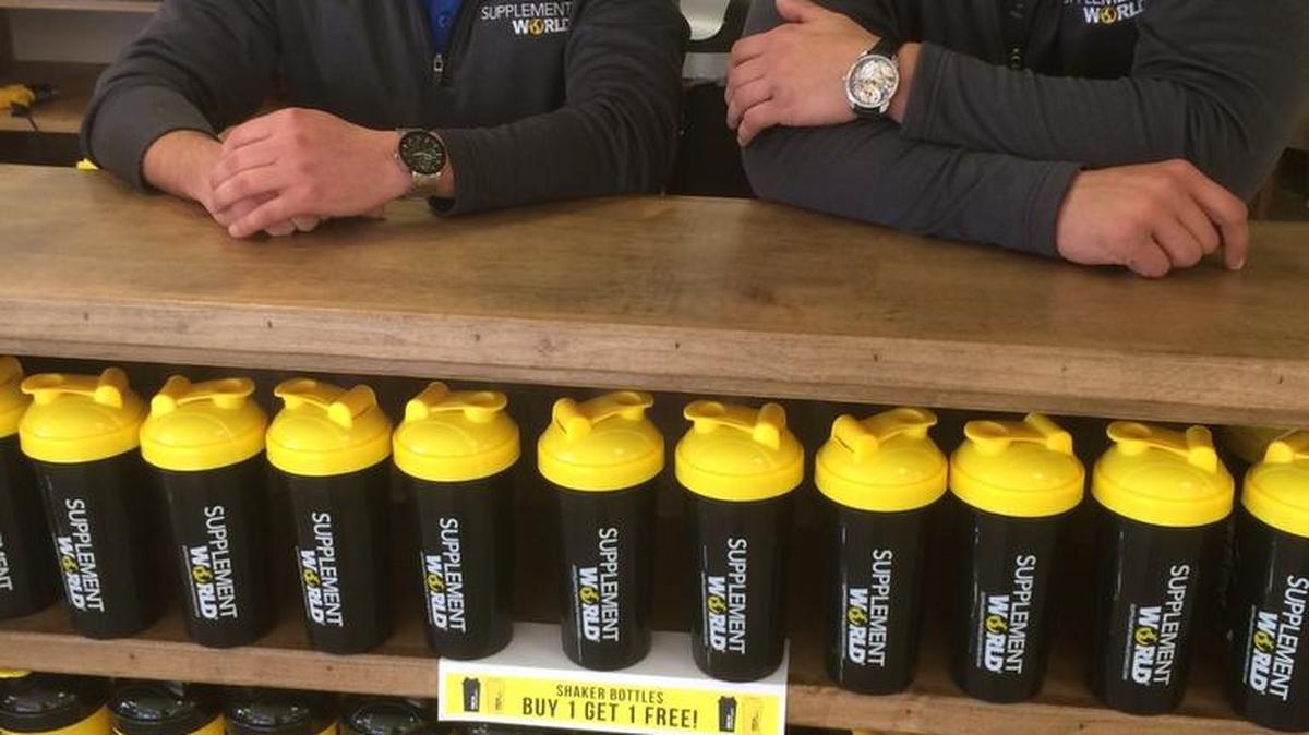 Jeff McAnarney, left, and Dustin West own Supplement World stores in Wichita, Andover and Oklahoma, with plans for more in the future. McAnarney says sponsoring local athletes, weightlifters and bodybuilders has helped build brand awareness.
