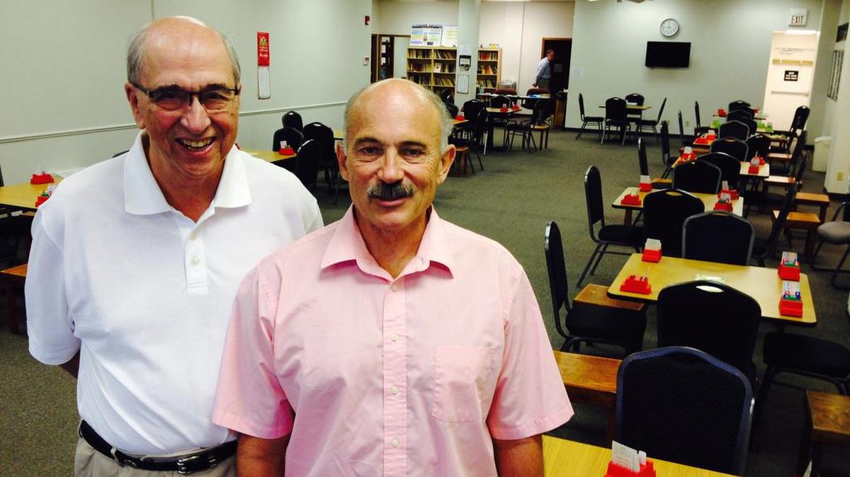 
Steve Drumhiller, right, moved the Wichita Duplicate Bridge Center to a bigger space in Parklane Shopping Center two years ago. Charles Wiggins is a regular player and volunteer at the center.
