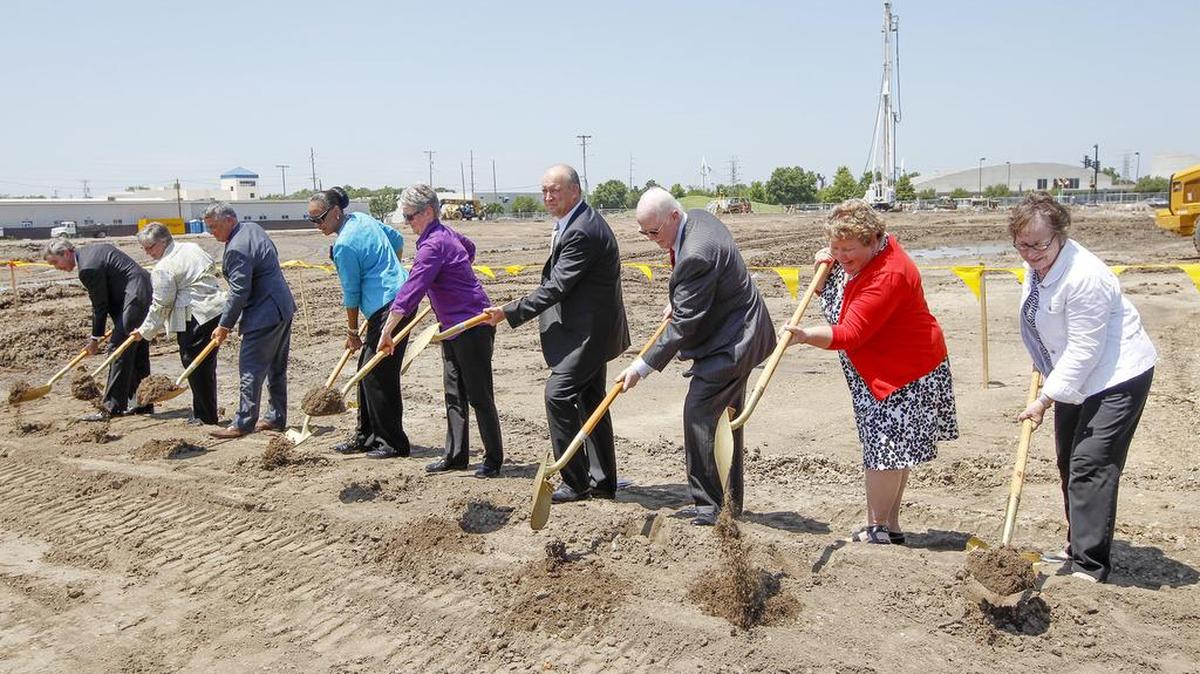 City officials and members of the Library Foundation break ground for the new library at the southeast corner of McLean and Second Street in July. The city has received proposals for another development to be built near where the library and River Vista apartments are under construction.