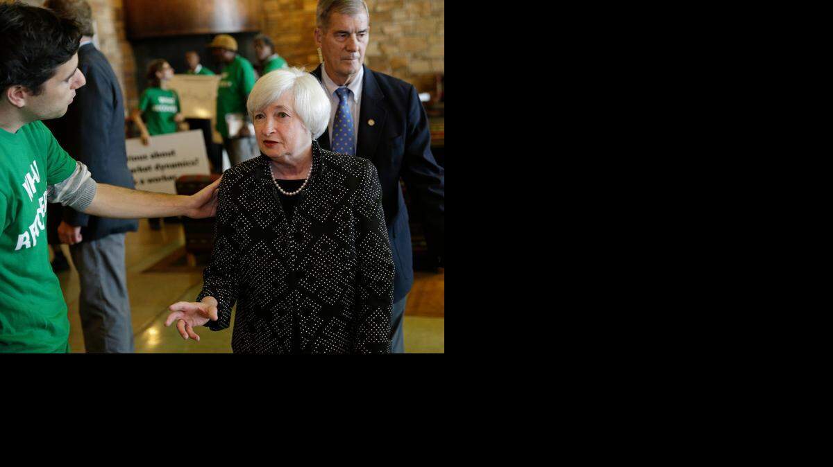 
Federal Reserve Chair Janet Yellen, right, speaks with Ady Barkan of the Center for Popular Democracy as she arrives for a dinner during the Jackson Hole Economic Policy Symposium at the Jackson Lake Lodge in Grand Teton National Park near Jackson, Wyo. Thursday.
