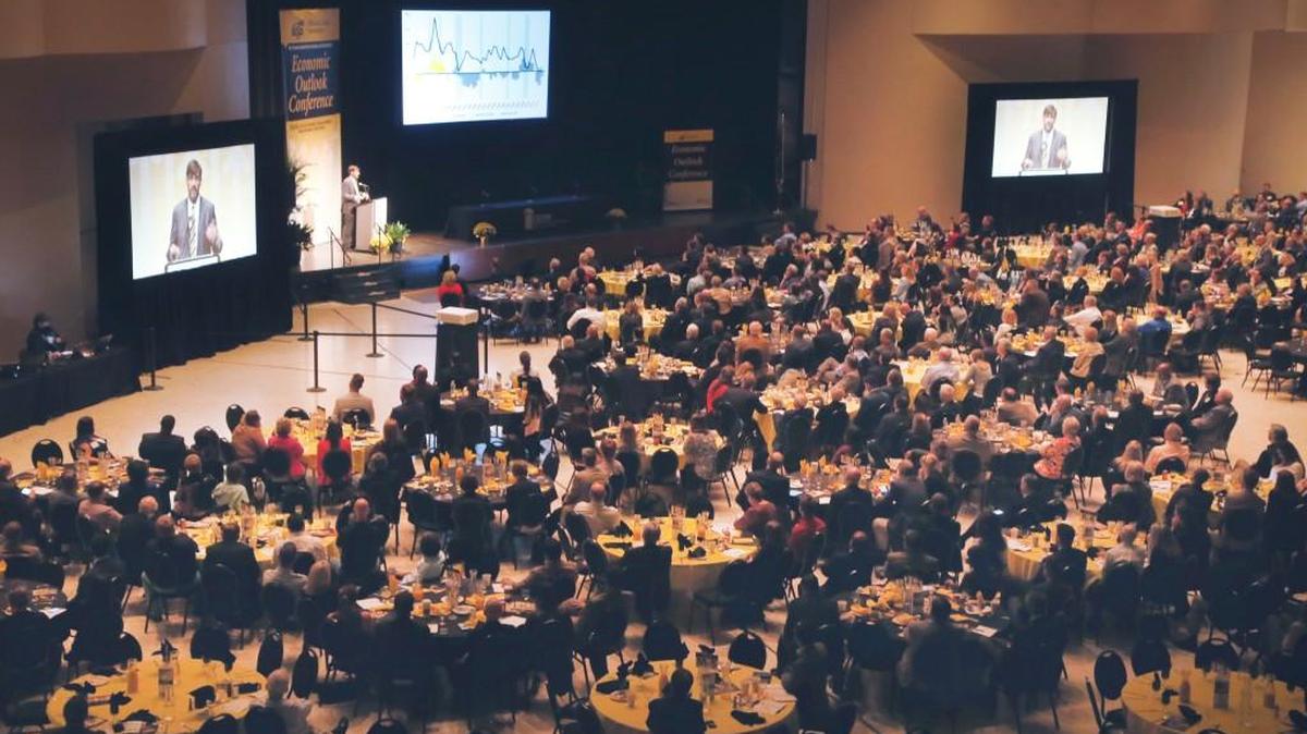 Jeremy Hill, director of the Center for Economic Development and Business Research at Wichita State University, addresses the annual Wichita Area Economic Outlook Conference at Century II Thursday morning. (October 6, 2016)