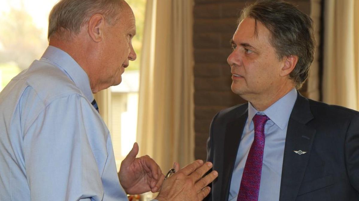 Lt. Gov. Jeff Colyer, right, listens to Paul Spranger of Midwest Corporate Aviation, after speaking to the Wichita Aero Club at its luncheon Tuesday at Crestview Country Club.