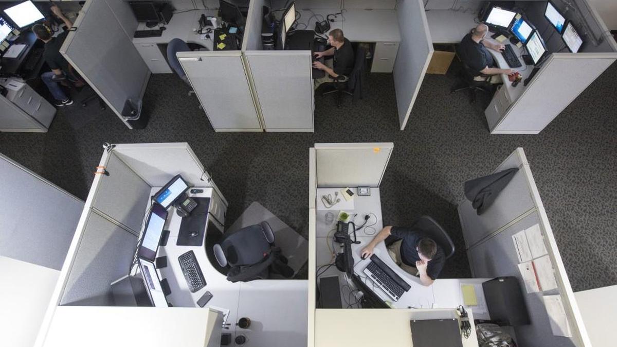 Employees at High Touch Technologies work in downtown Wichita. The company said it has worked with local colleges and universities to fine-tune training for future employees to battle a skills gap that is affecting the local economy.