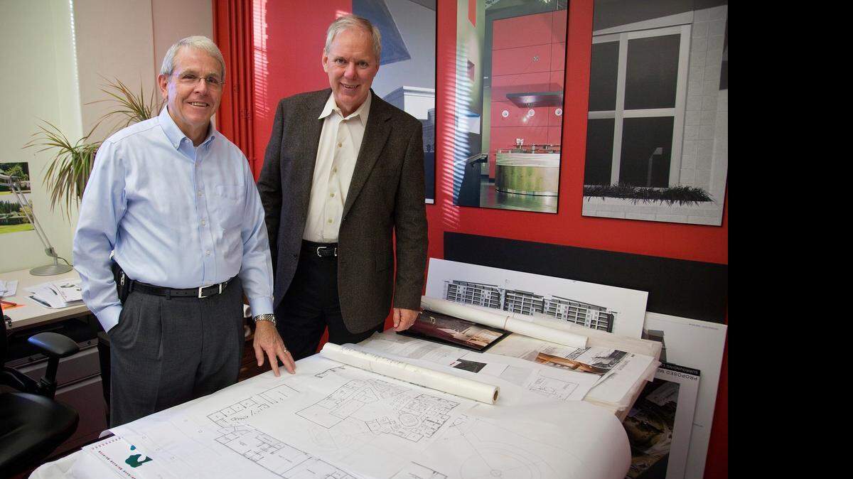 
Dan Wilson, left, and Wes Darnell, founders of WDM Architects, in 2010. Darnell is retiring on July 31 after 35 years with the firm.
