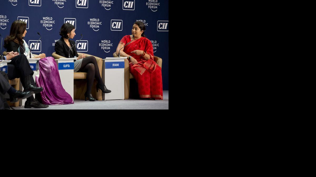 
Indian Minister for Human Resource Development Smriti Irani, right, speaks during a panel discussion at the India Economic Summit in New Delhi, India, on Wednesday. Business leaders, government, civil society and academia representatives from more than 40 countries are participating in the three-day summit, organized by the World Economic Forum.

