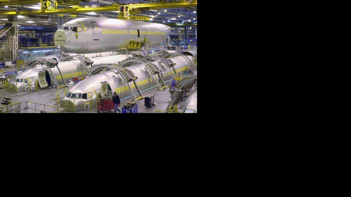 
A crane lifts a 737-700 fuselage out of the integration section at Spirit AeroSystems. A new study has ranked Wichita third in the nation for its concentration of jobs in advanced industries.
